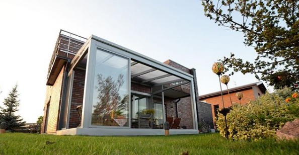 Innglasset terrasse forvandlet til en utestue i glass